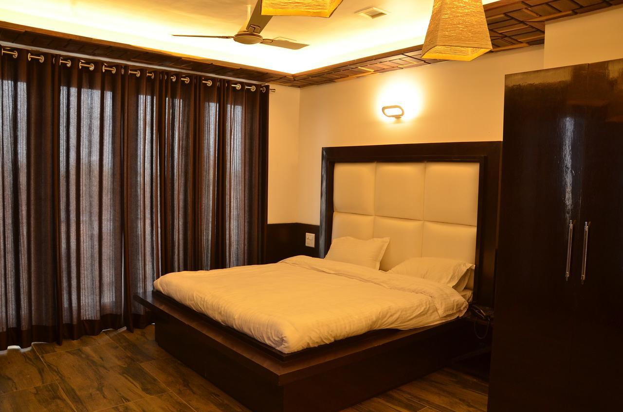 Hotel Bellevue Inn Gangānagar Szoba fotó