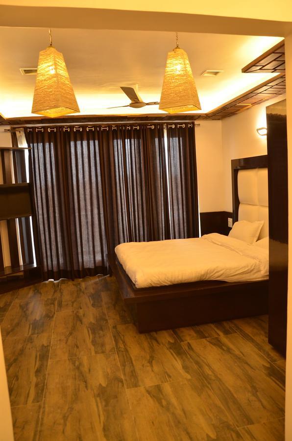 Hotel Bellevue Inn Gangānagar Szoba fotó