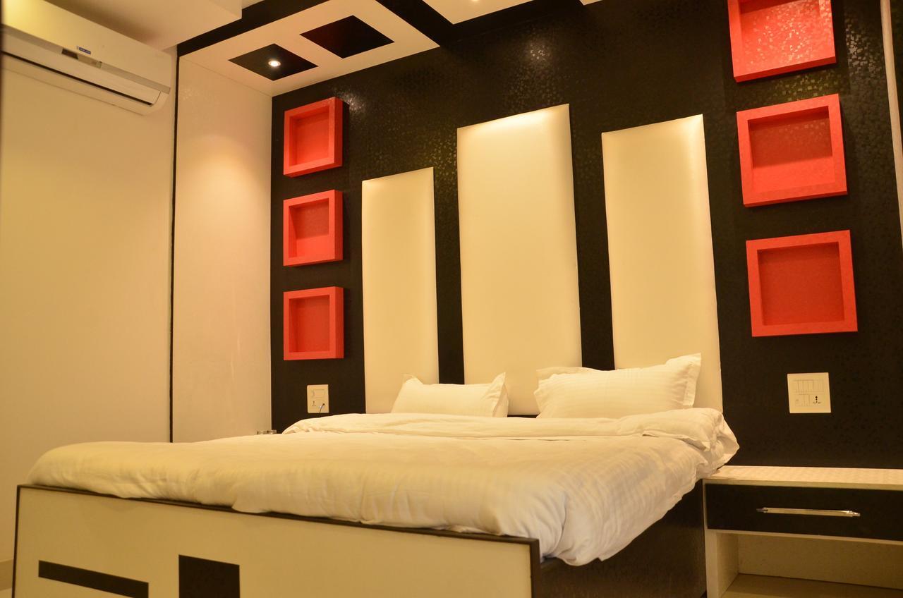 Hotel Bellevue Inn Gangānagar Szoba fotó